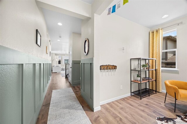 8261 Garden City Ave, Littleton, CO 80125 - hall featuring wood finished floors, baseboards, and recessed lighting