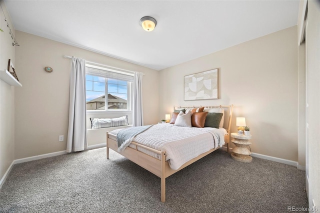 8261 Garden City Ave, Littleton, CO 80125 - carpeted bedroom with baseboards