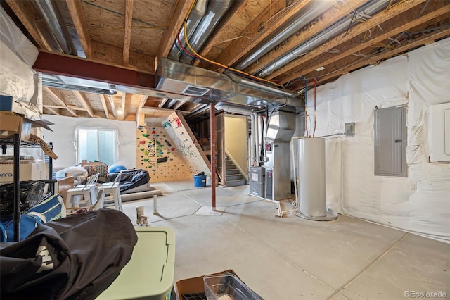 8261 Garden City Ave, Littleton, CO 80125 - unfinished basement featuring electric panel, water heater, heating unit, and stairs
