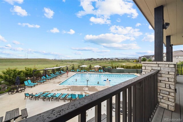 8261 Garden City Ave, Littleton, CO 80125 - community pool with a patio area
