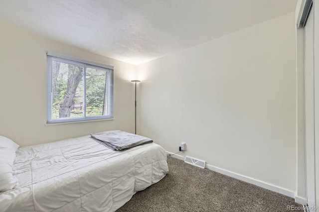 5712 S Lowell Blvd, Littleton, CO 80123 - bedroom with carpet floors and baseboards