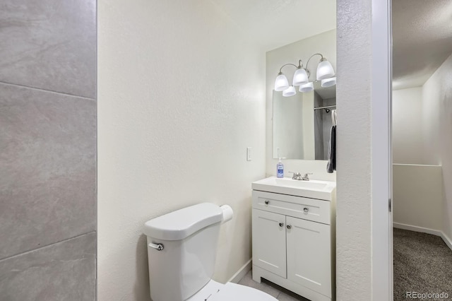 5712 S Lowell Blvd, Littleton, CO 80123 - full bathroom with vanity, toilet, and baseboards