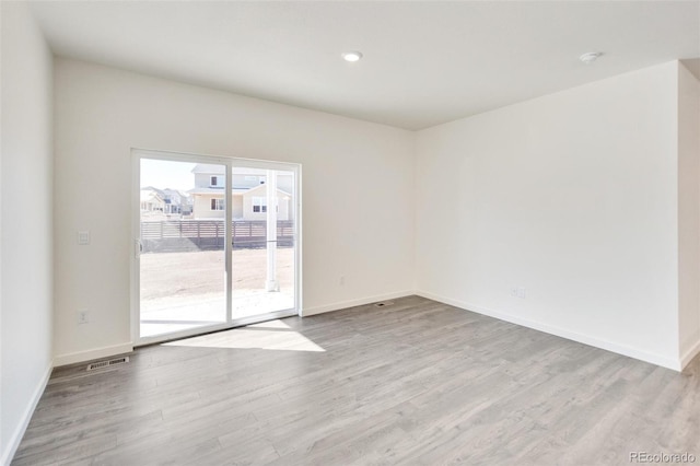 11790 Foraker Ln, Colorado Springs, CO 80925 - unfurnished room featuring wood finished floors and recessed lighting