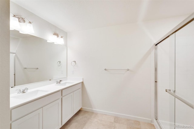 11790 Foraker Ln, Colorado Springs, CO 80925 - bathroom featuring double vanity and tiled shower