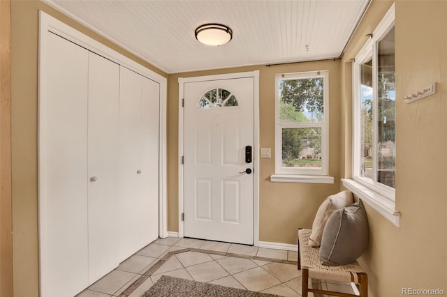 3979 S Grant St, Englewood, CO 80113 - foyer with light tile patterned floors and baseboards