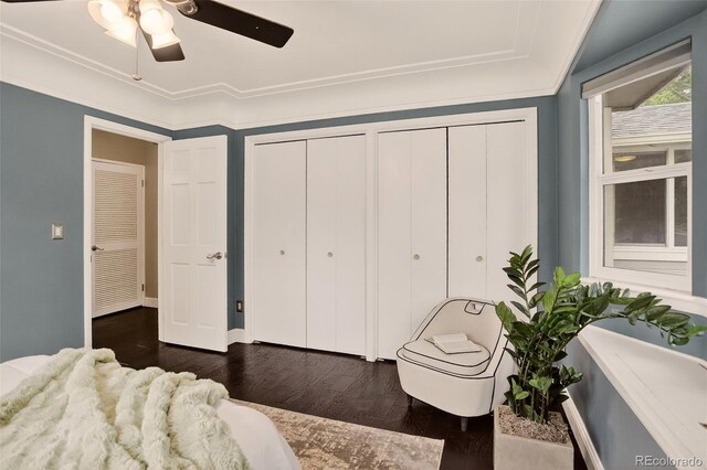 3979 S Grant St, Englewood, CO 80113 - bedroom with two closets, dark wood-style floors, and ceiling fan