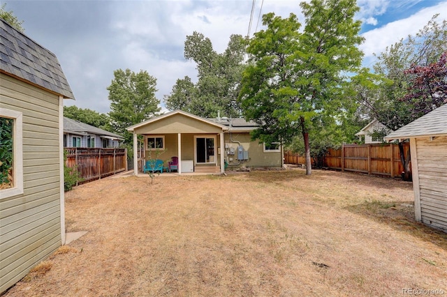 3979 S Grant St, Englewood, CO 80113 - rear view of house featuring a fenced backyard