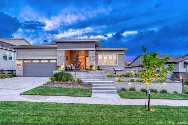 2159 Bellcove Dr, Castle Pines, CO 80108 - view of front of house featuring stone siding, an attached garage, driveway, a front lawn, and a porch