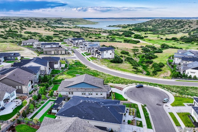 2159 Bellcove Dr, Castle Pines, CO 80108 - aerial perspective of suburban area featuring a large body of water
