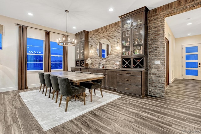 2159 Bellcove Dr, Castle Pines, CO 80108 - dining room featuring a chandelier, dark wood-style flooring, and recessed lighting