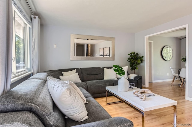 13483 Achilles Dr, Lone Tree, CO 80124 - living area with light wood-type flooring and baseboards