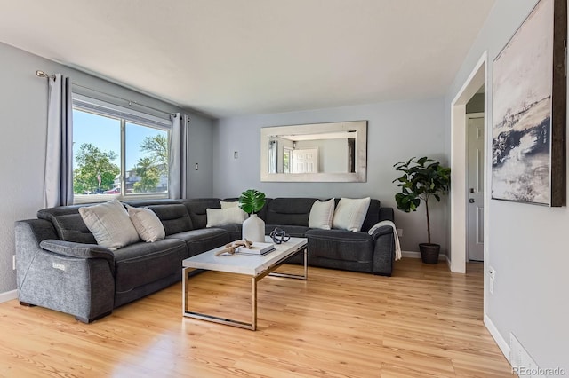 13483 Achilles Dr, Lone Tree, CO 80124 - living area featuring light wood finished floors and baseboards
