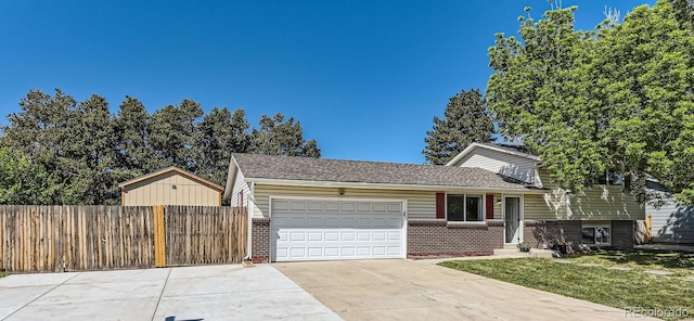 13483 Achilles Dr, Lone Tree, CO 80124 - tri-level home with brick siding, a garage, and driveway