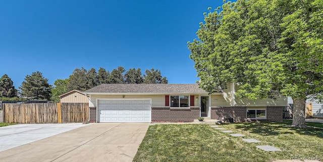 13483 Achilles Dr, Lone Tree, CO 80124 - split level home featuring brick siding, an attached garage, and driveway