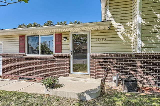 13483 Achilles Dr, Lone Tree, CO 80124 - view of exterior entry with brick siding