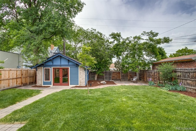 3525 N Alcott St, Denver, CO 80211 - view of yard featuring french doors and an outdoor structure