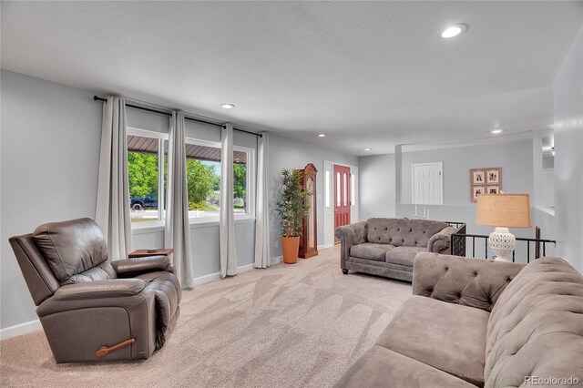 9880 E 157th Ave, Brighton, CO 80602 - carpeted living area featuring baseboards and recessed lighting