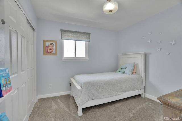 9880 E 157th Ave, Brighton, CO 80602 - bedroom with carpet flooring, baseboards, and a closet