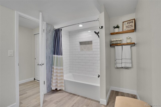 9880 E 157th Ave, Brighton, CO 80602 - bathroom with wood finished floors, shower / bath combination with curtain, baseboards, and recessed lighting