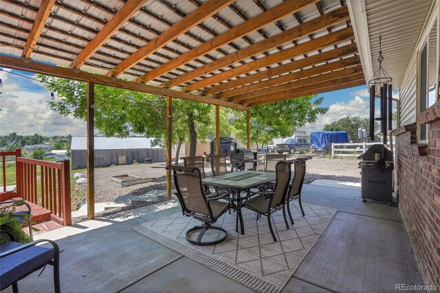 9880 E 157th Ave, Brighton, CO 80602 - view of patio / terrace featuring outdoor dining space and a grill
