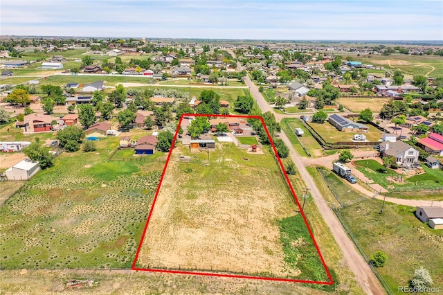 9880 E 157th Ave, Brighton, CO 80602 - aerial perspective of suburban area featuring property parcel outlined