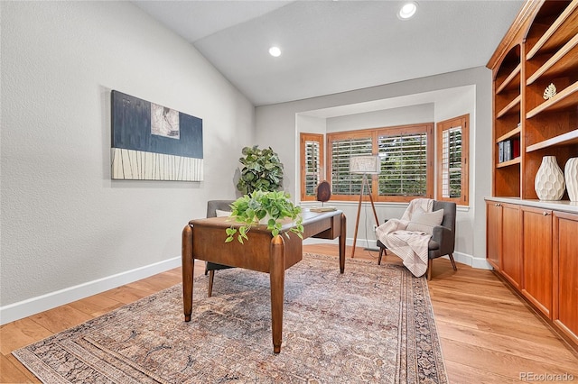 office with light wood-style flooring, baseboards, lofted ceiling, and recessed lighting