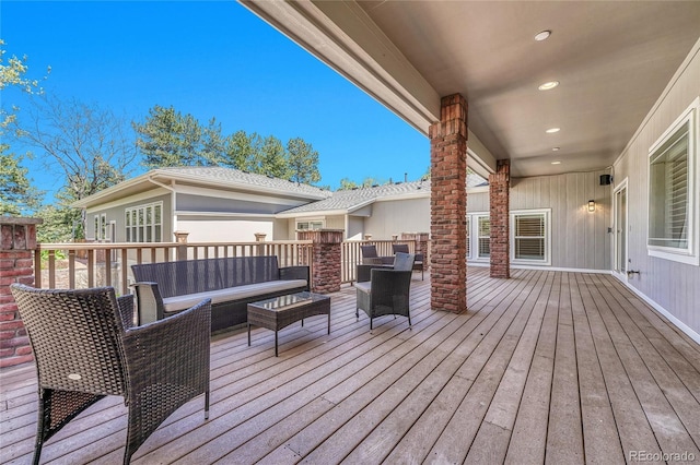 deck featuring an outdoor living space