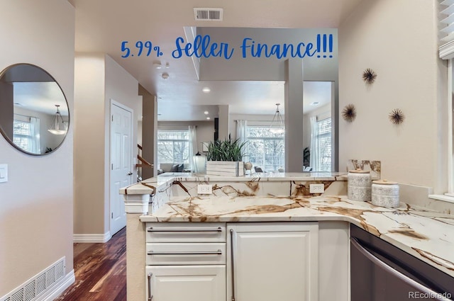 kitchen featuring light stone counters, white cabinetry, dishwashing machine, and dark wood-type flooring