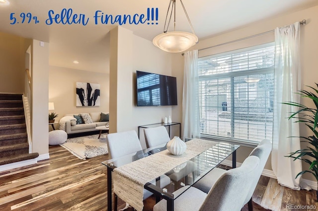 dining space featuring hardwood / wood-style flooring