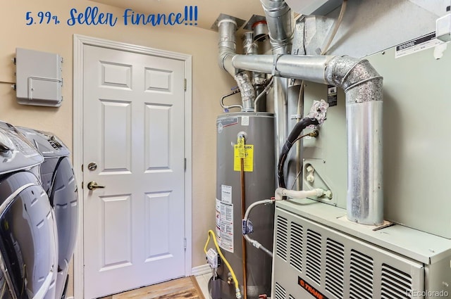 utilities with water heater and separate washer and dryer