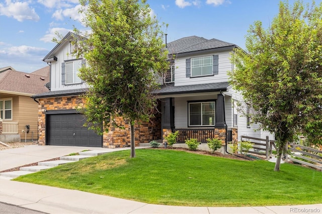 5021 S Rome St, Aurora, CO 80015 - view of front of house featuring an attached garage, driveway, stone siding, a porch, and roof with shingles
