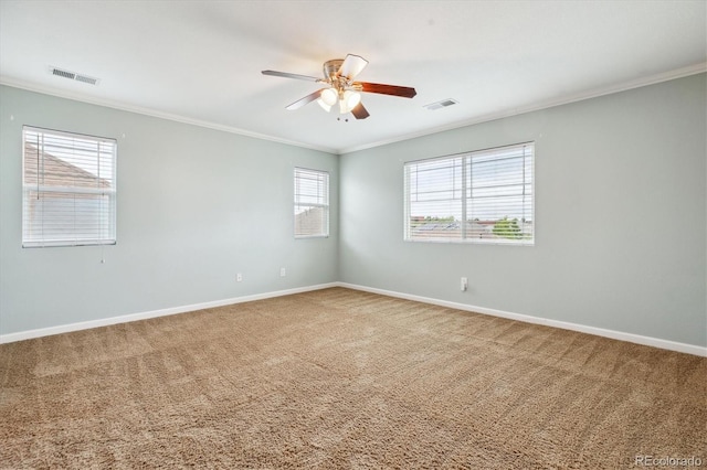 5021 S Rome St, Aurora, CO 80015 - carpeted empty room featuring crown molding, a ceiling fan, and baseboards