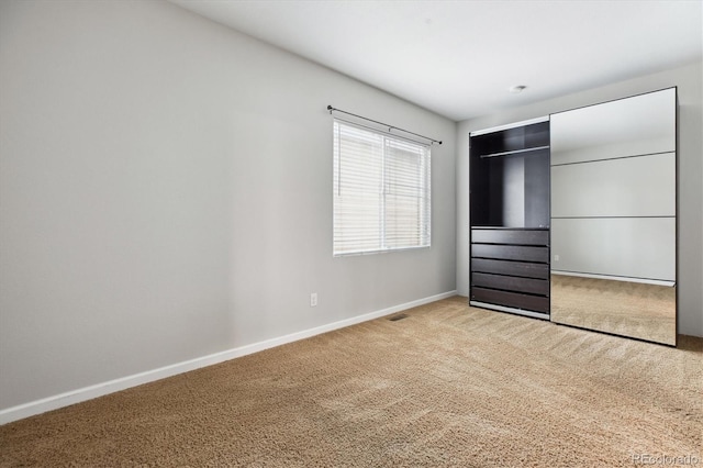 5021 S Rome St, Aurora, CO 80015 - unfurnished bedroom with carpet, baseboards, and a closet