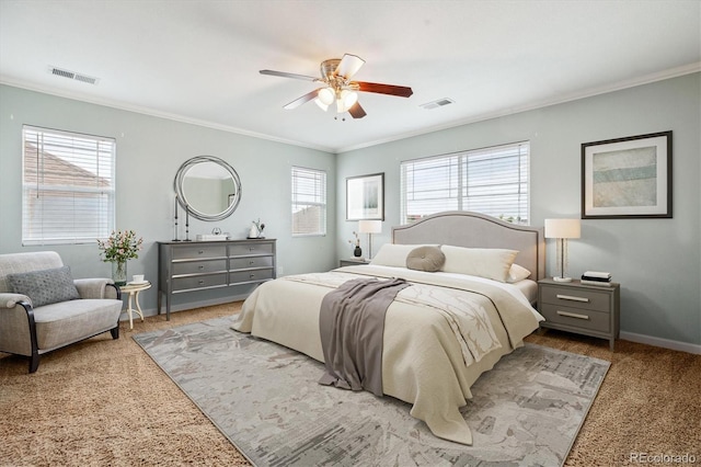 5021 S Rome St, Aurora, CO 80015 - carpeted bedroom featuring ornamental molding, multiple windows, baseboards, and a ceiling fan