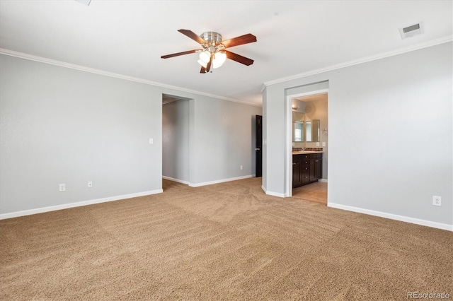 5021 S Rome St, Aurora, CO 80015 - unfurnished room featuring crown molding, ceiling fan, light colored carpet, and baseboards