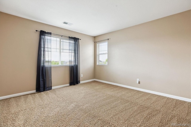 5021 S Rome St, Aurora, CO 80015 - unfurnished room with light carpet and baseboards