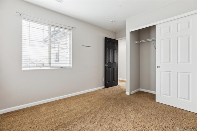 5021 S Rome St, Aurora, CO 80015 - unfurnished bedroom with carpet flooring, a closet, and baseboards