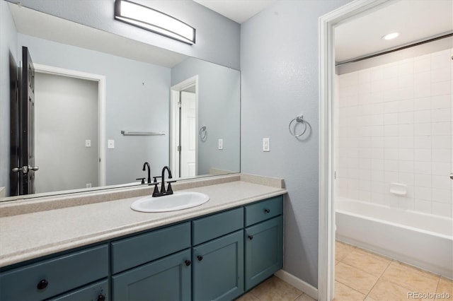 5021 S Rome St, Aurora, CO 80015 - full bath with tile patterned floors, vanity, and  shower combination