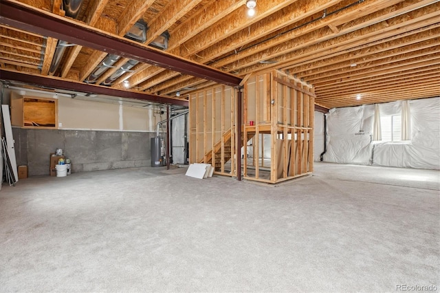 5021 S Rome St, Aurora, CO 80015 - basement featuring gas water heater and stairway