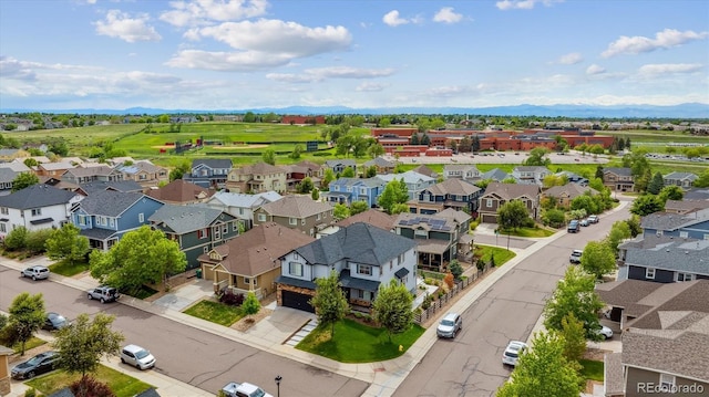 5021 S Rome St, Aurora, CO 80015 - aerial view of residential area featuring a mountainous background