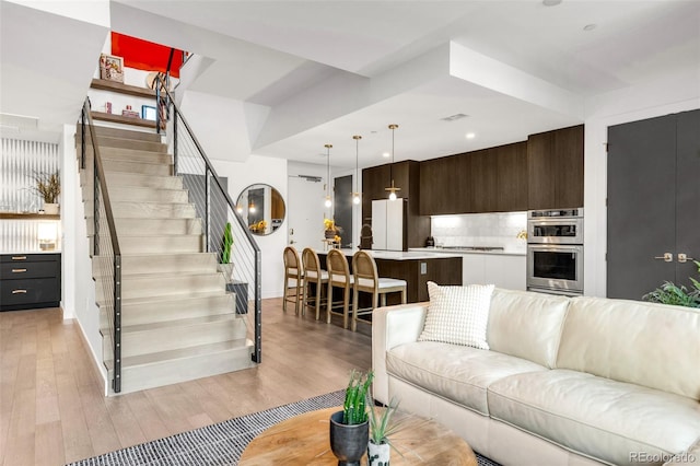 living room featuring light hardwood / wood-style floors