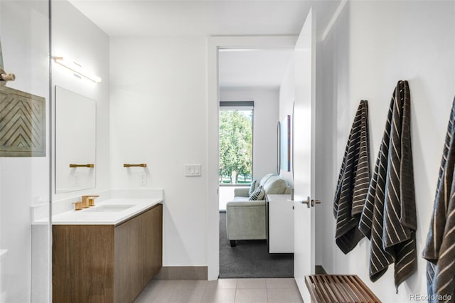 bathroom with tile patterned flooring and vanity