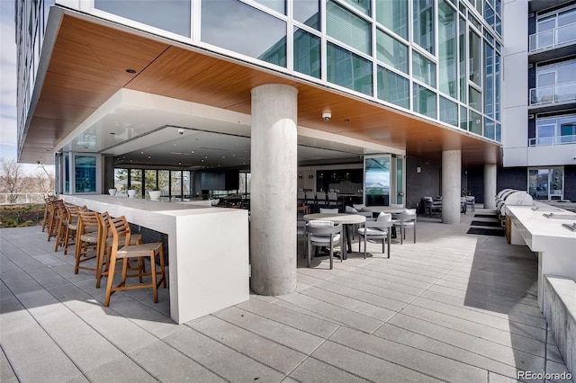 view of patio / terrace with exterior bar