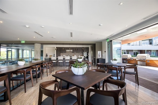 dining room with light hardwood / wood-style floors