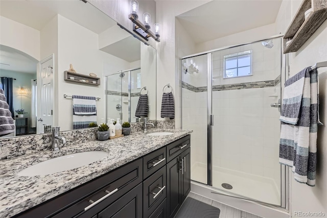 12910 Grant Cir W Unit C, Thornton, CO 80241 - bathroom with a shower stall and double vanity