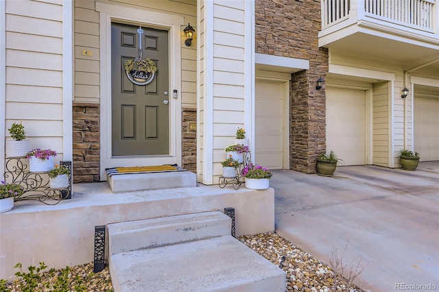 12910 Grant Cir W Unit C, Thornton, CO 80241 - property entrance with stone siding, a garage, and a balcony