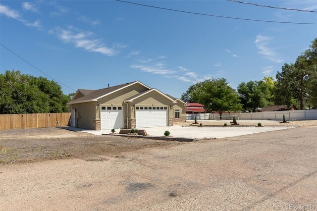 view of front of home with a garage