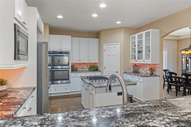 6405 Eagle Feather Trl, Littleton, CO 80125 - kitchen featuring stainless steel appliances, white cabinetry, and recessed lighting