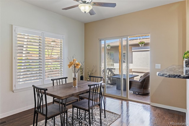 6405 Eagle Feather Trl, Littleton, CO 80125 - dining space featuring a ceiling fan, baseboards, and wood finished floors