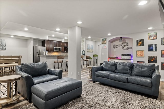 6405 Eagle Feather Trl, Littleton, CO 80125 - living room with recessed lighting and wood finished floors